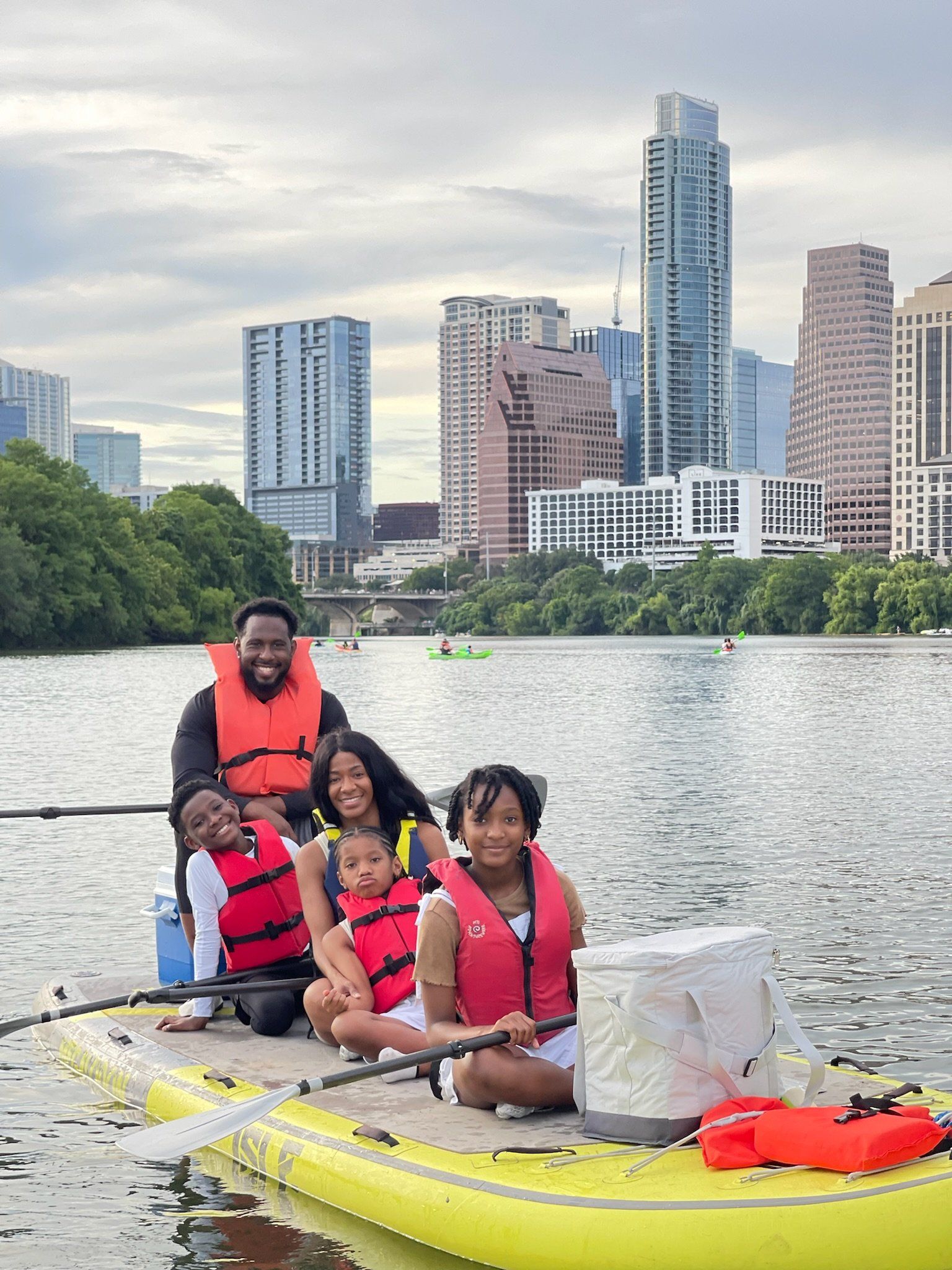 family on the boats and bats giant paddle board bat tour in austin