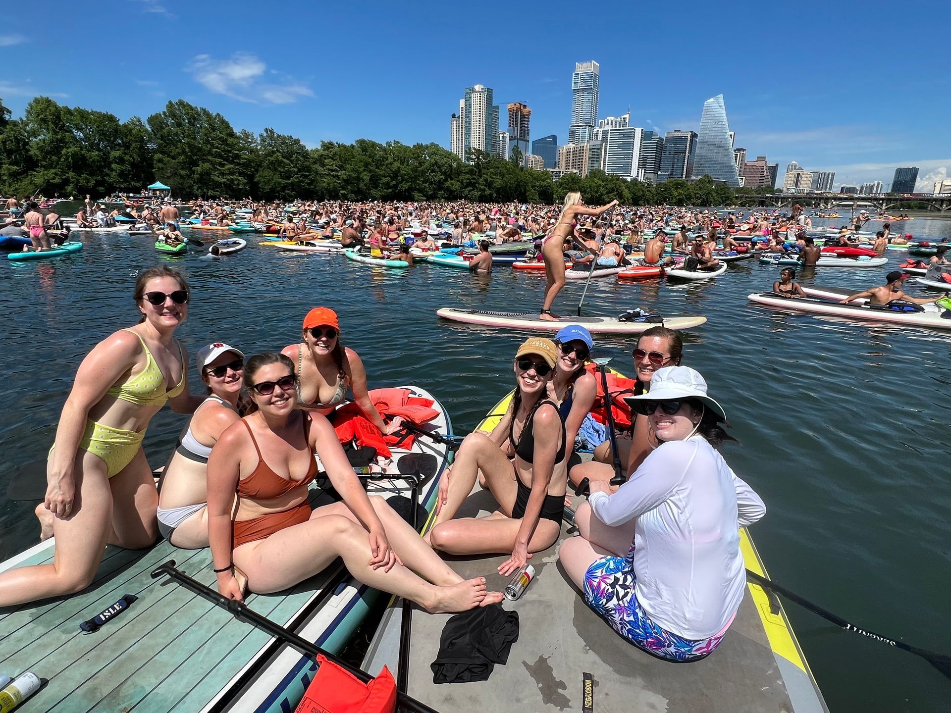 Tour guide instructing paddlers on safety procedures before a tour on Lady Bird Lake.