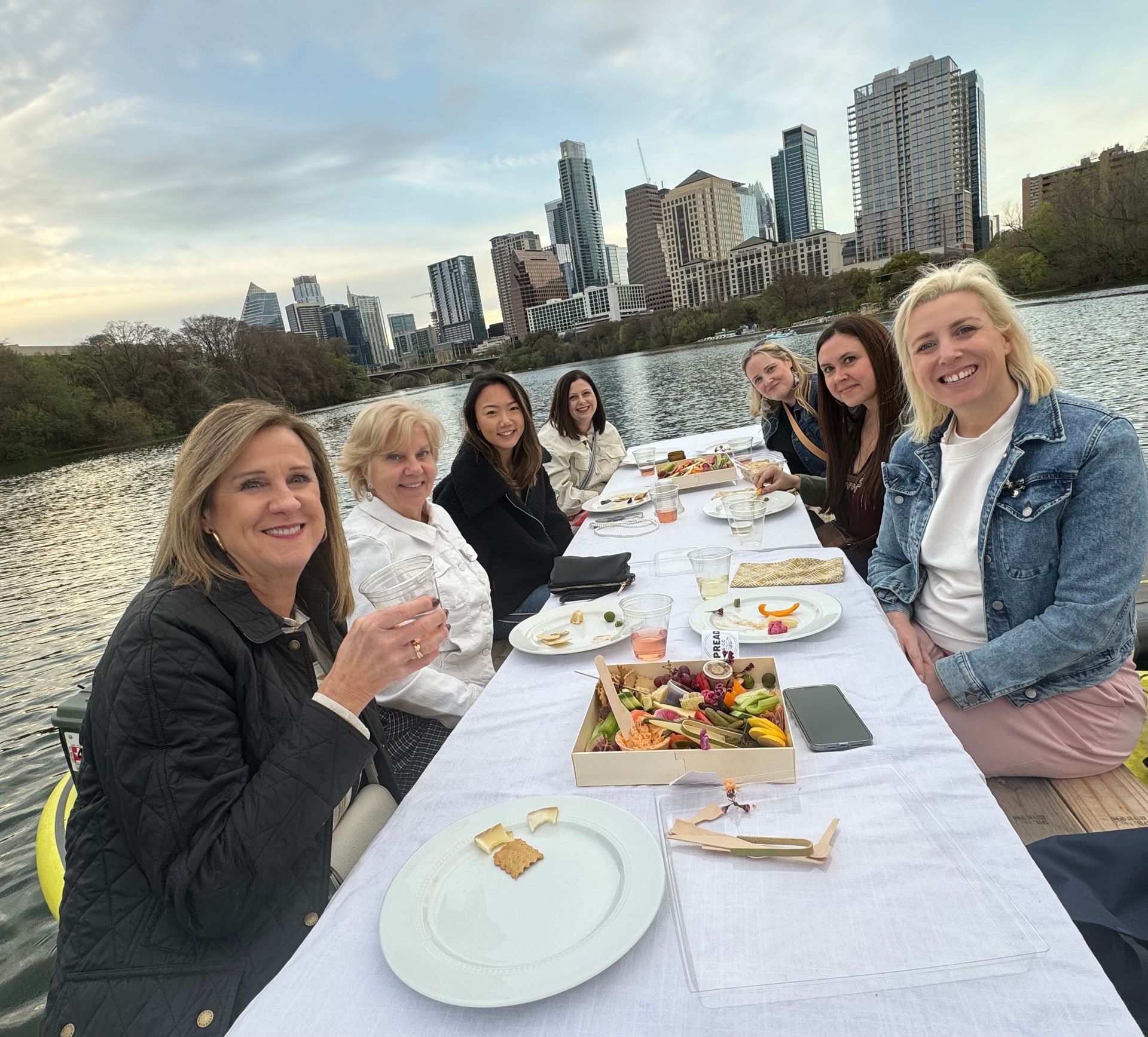 Private paddle tour group on Lady Bird Lake with Austin skyline in background
