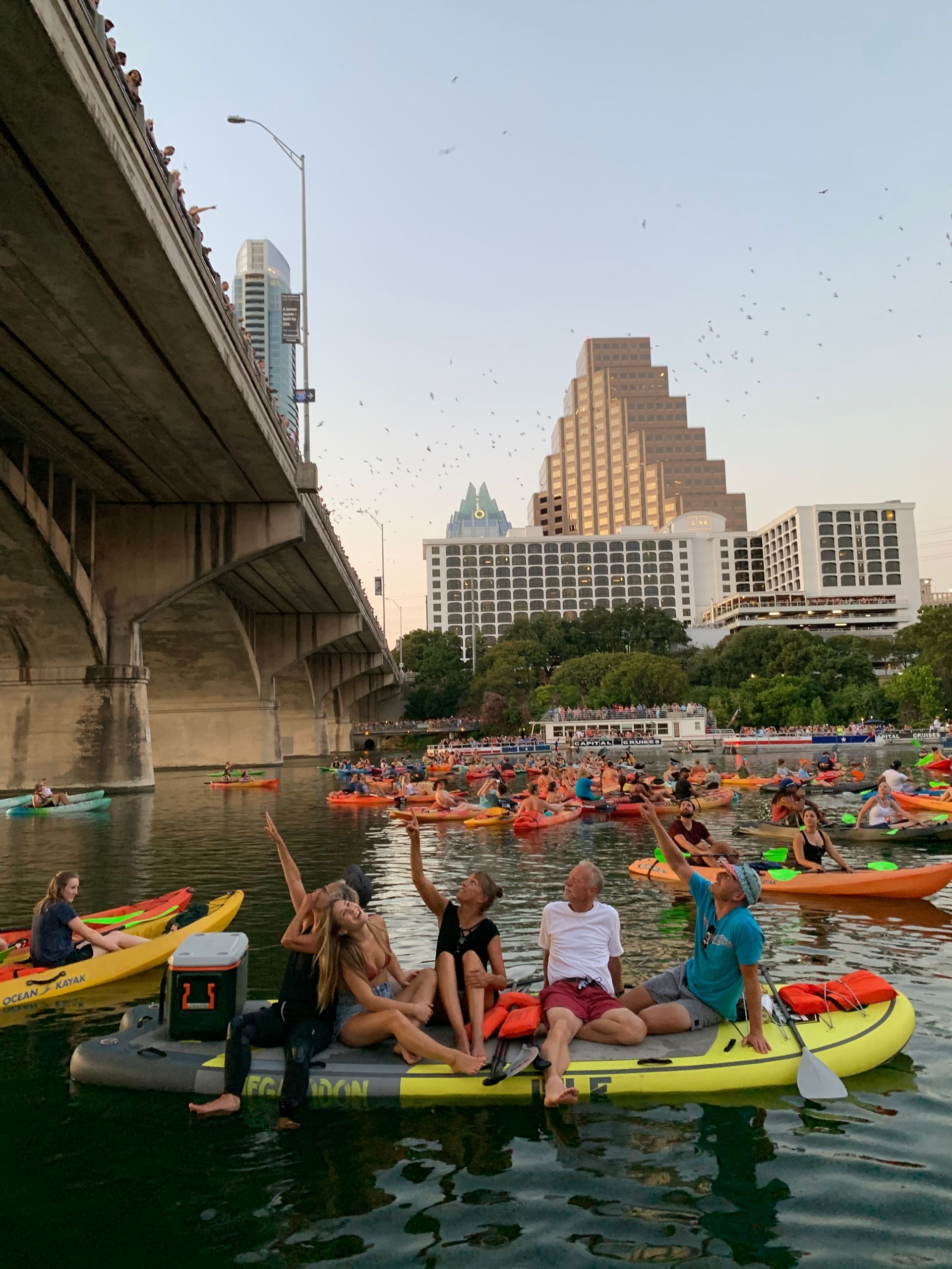 a bachelorette party enjoying paddleboarding on Lady Bird Lake