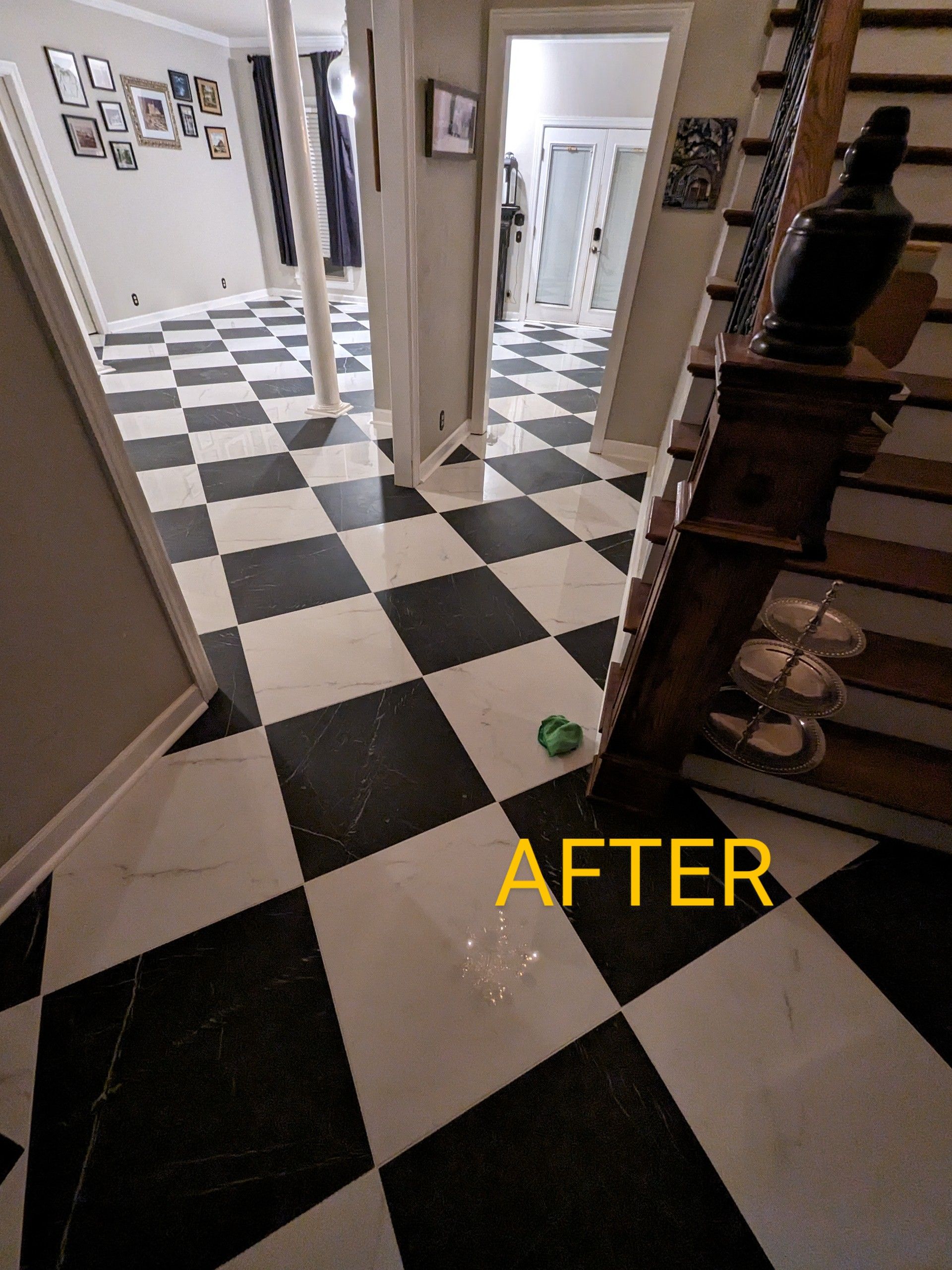A black and white checkered floor in a hallway
