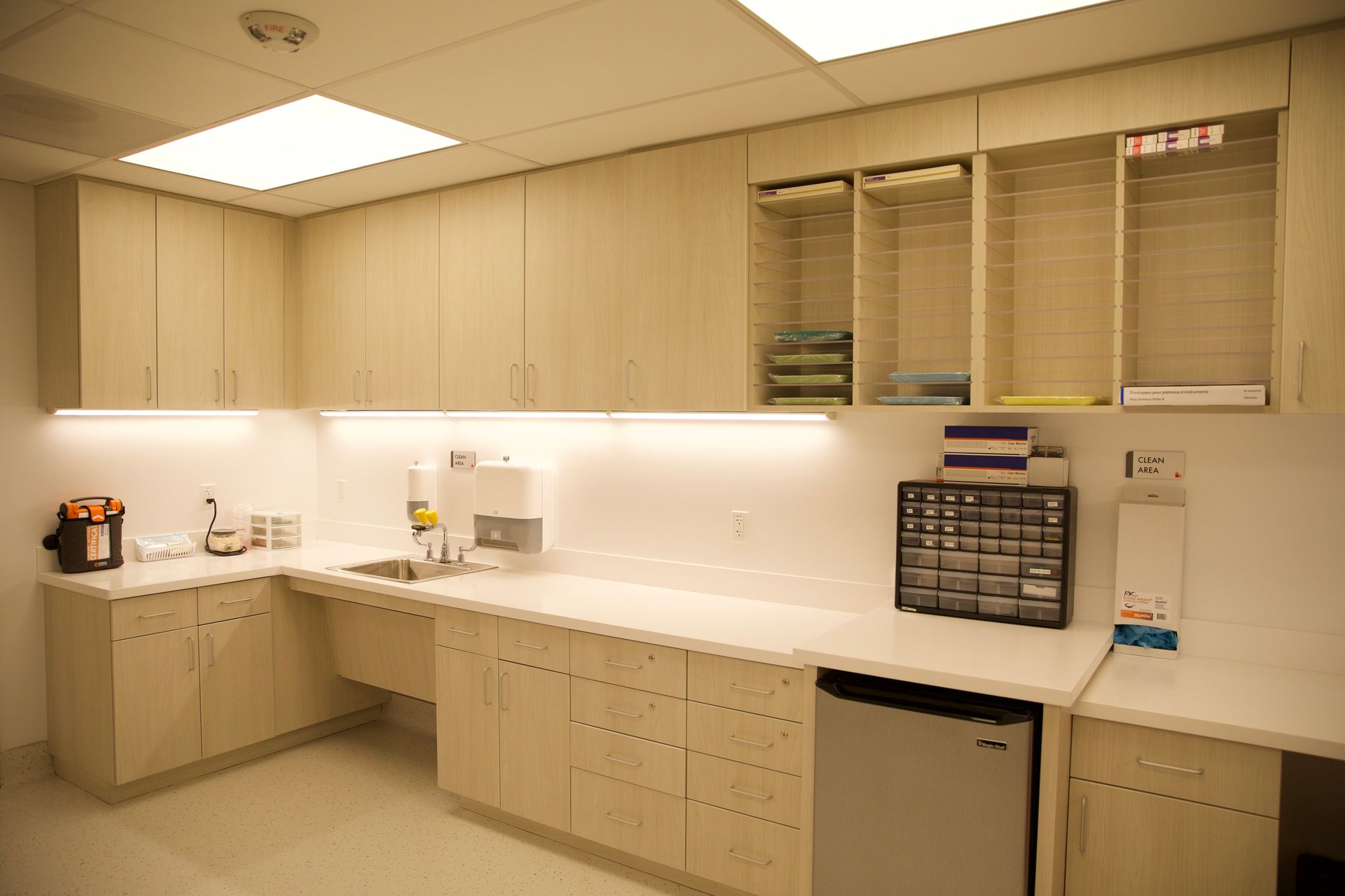 A kitchen with lots of cabinets and a sink
