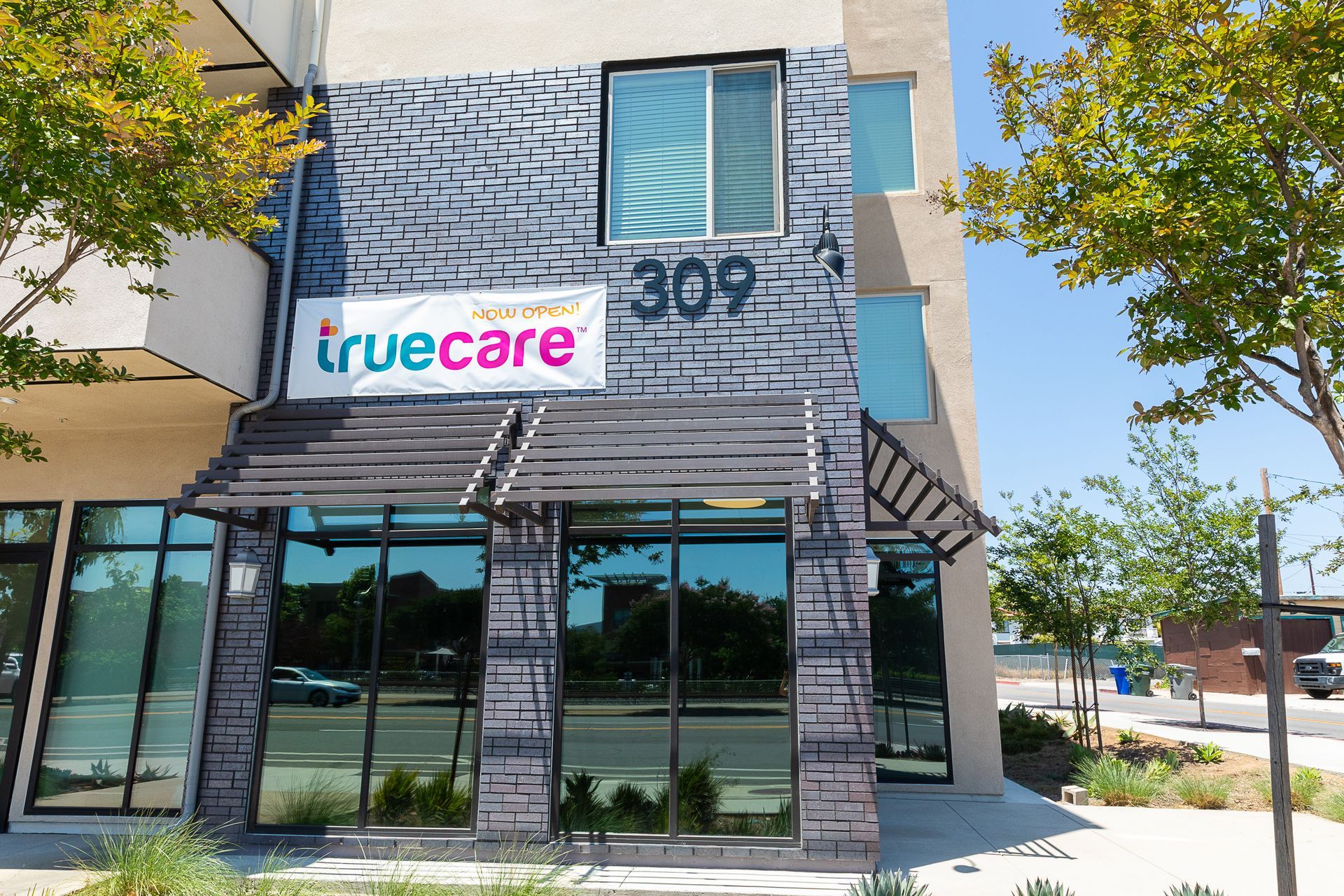 A building with a sign that says truecare on it