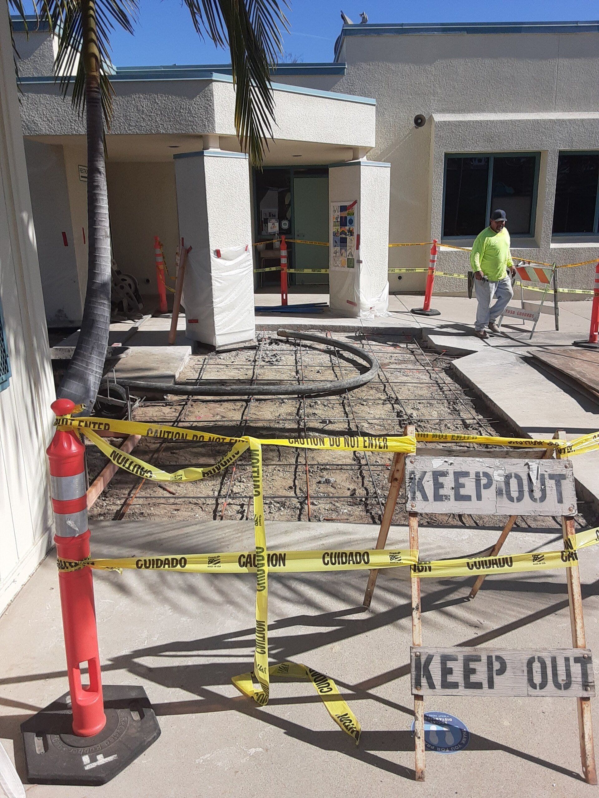 A construction site with a sign that says keep out