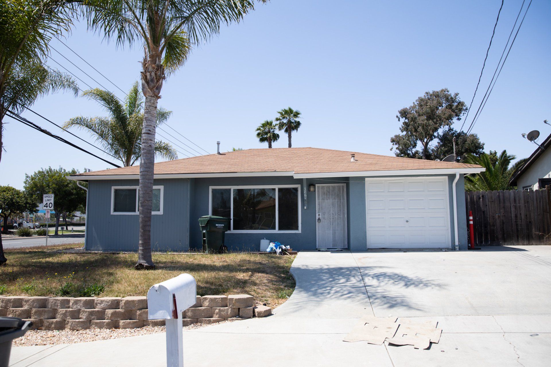 A house with a mailbox in front of it