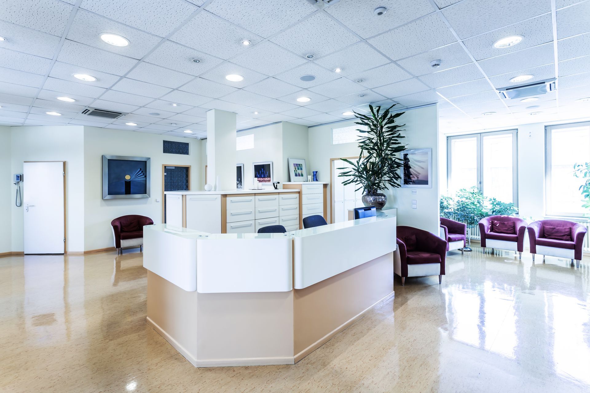 There is a reception desk in the middle of the room.