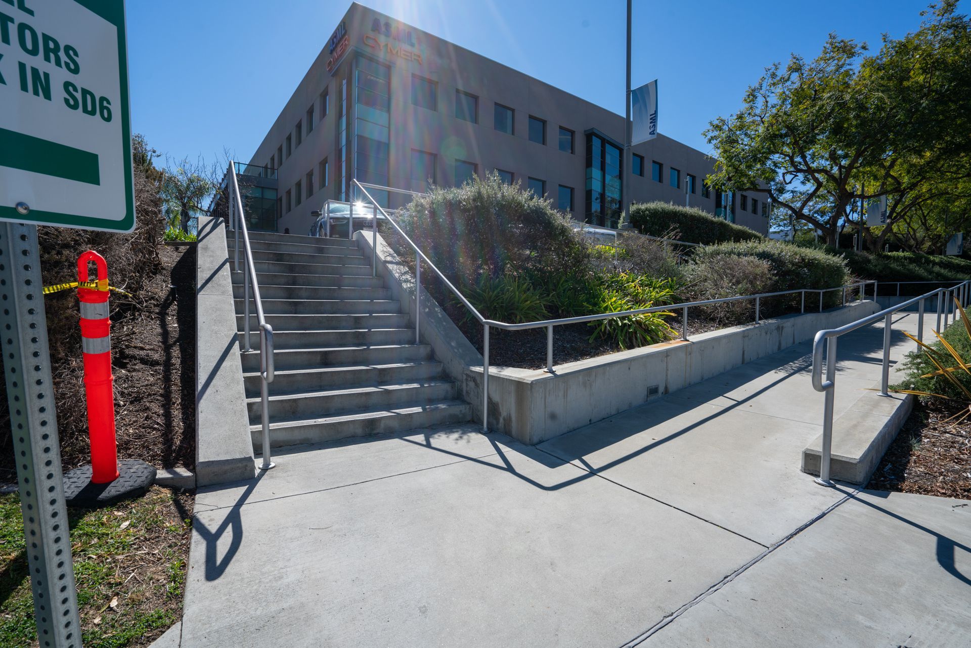 A building with stairs leading up to it and a sign that says doctors in sd6
