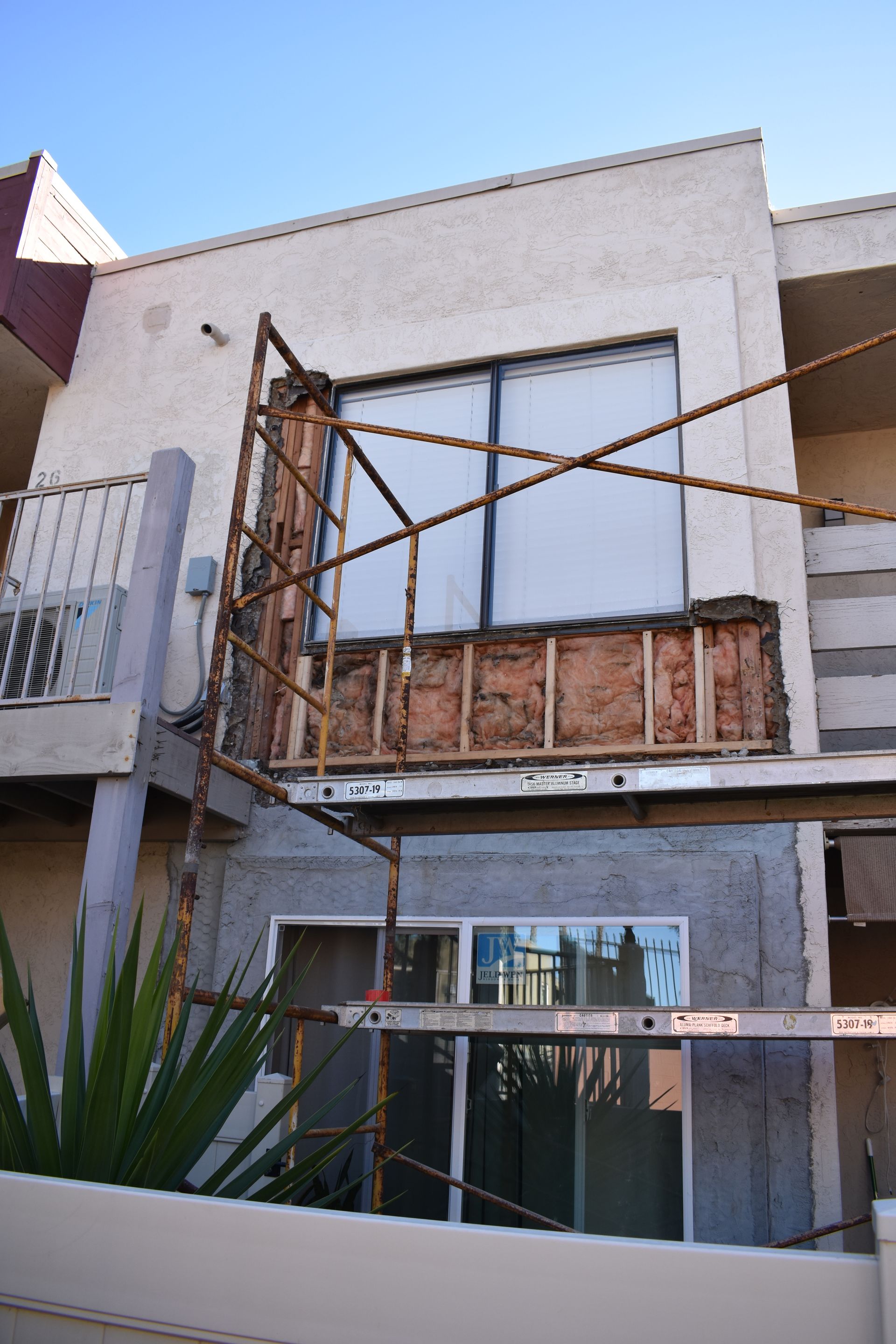 A building under construction with scaffolding around it