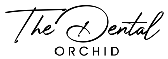 A black and white logo for a dental office called the dental orchid.