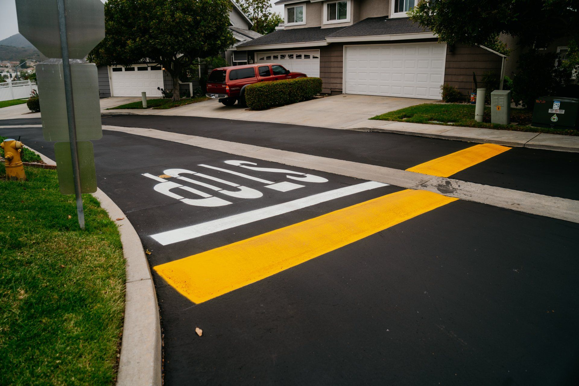 A bus stop is painted on the side of the road