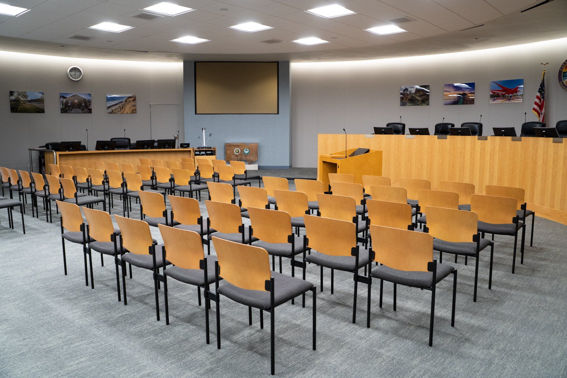 Rows of chairs are lined up in a conference room