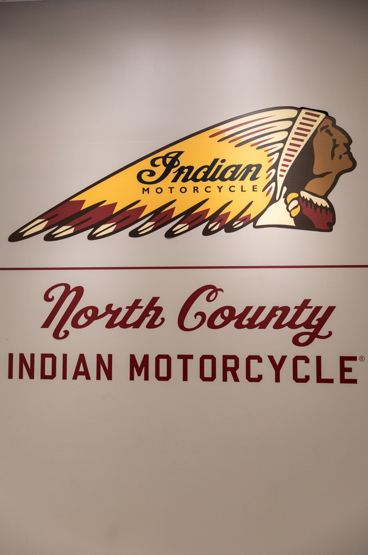 A sign that says north county indian motorcycle on it