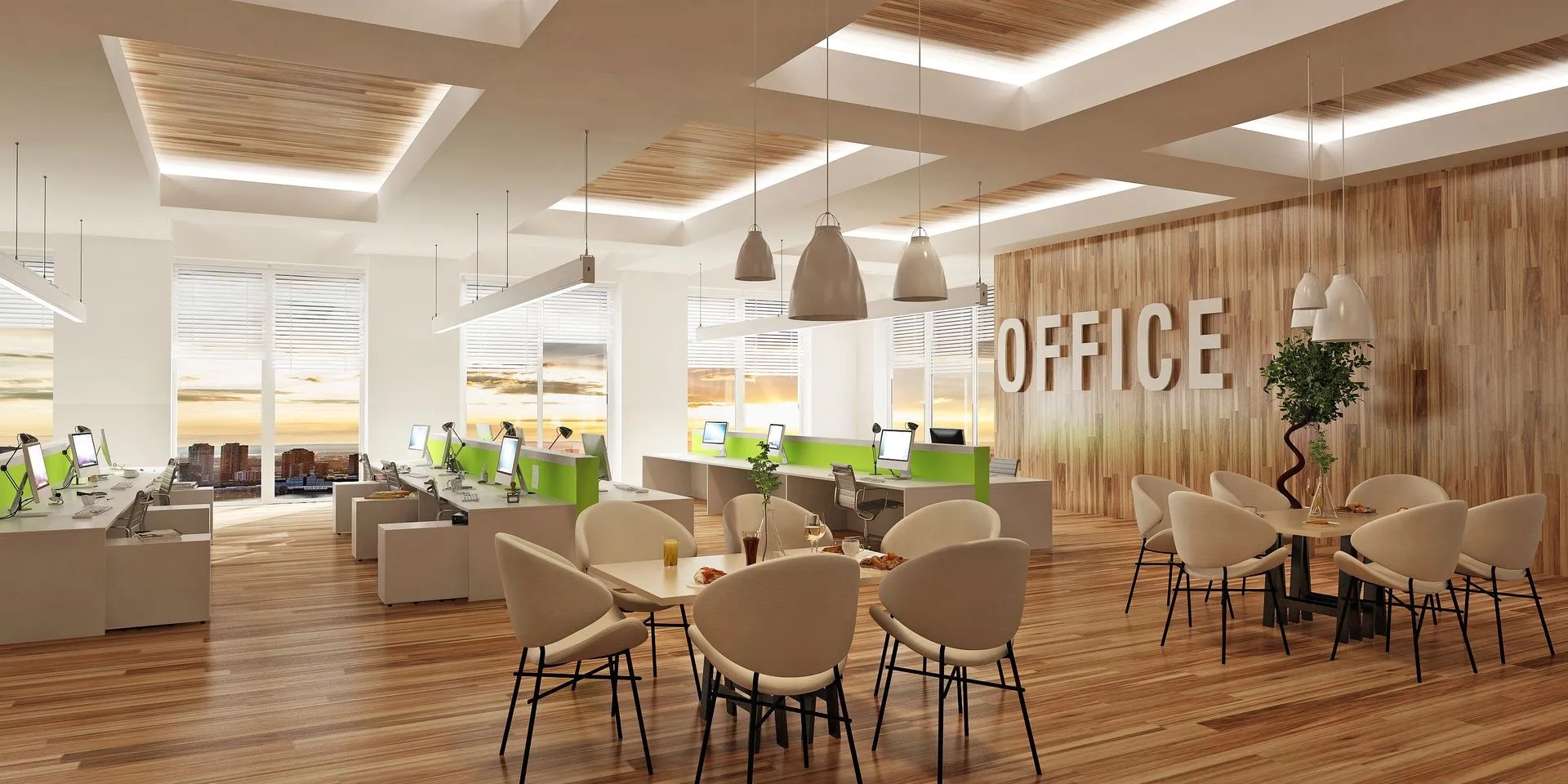 An office interior with workstations, a cafe area, and