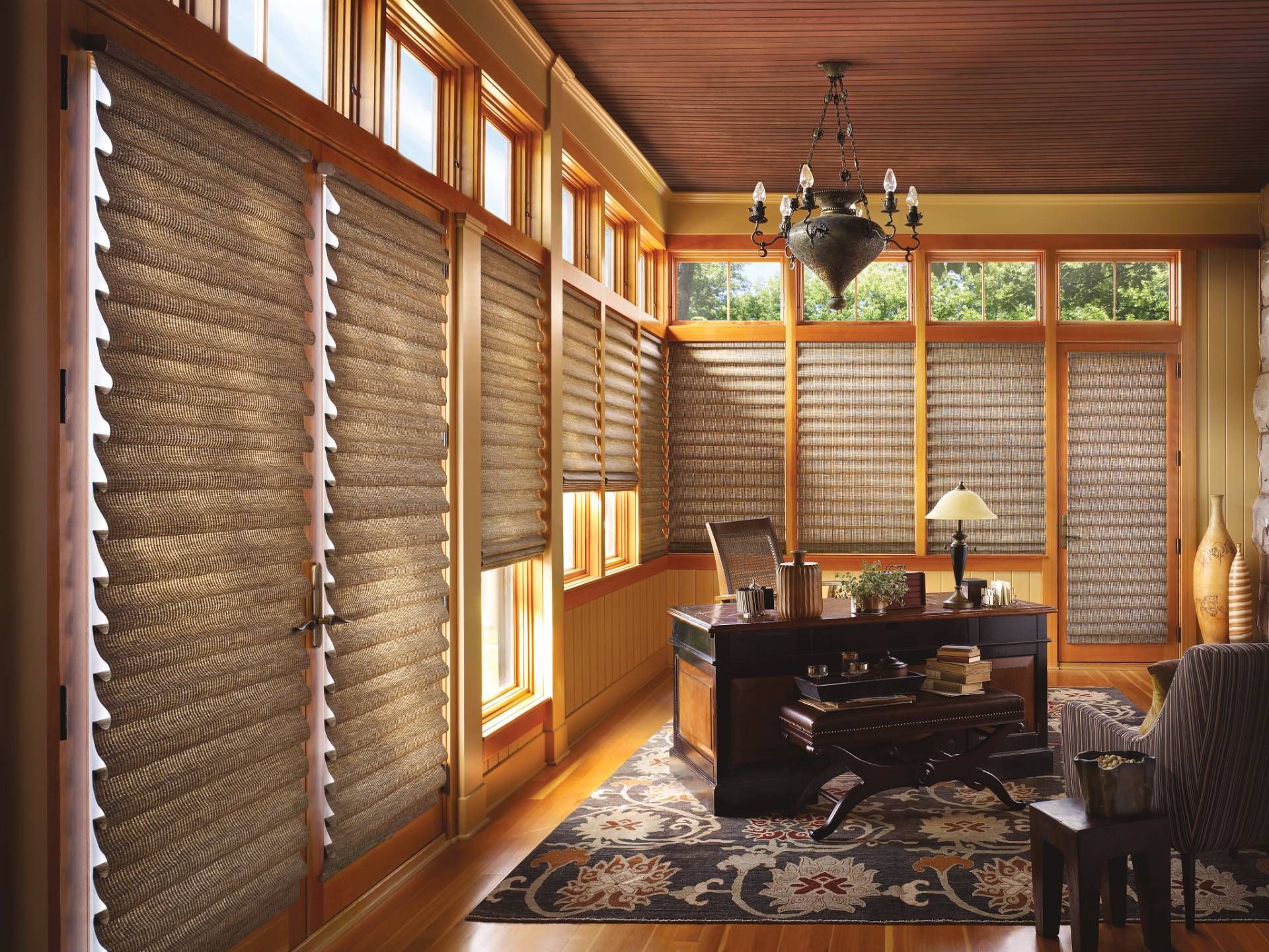 Hunter Douglas Vignette® Roman Shades in a traditional home office.