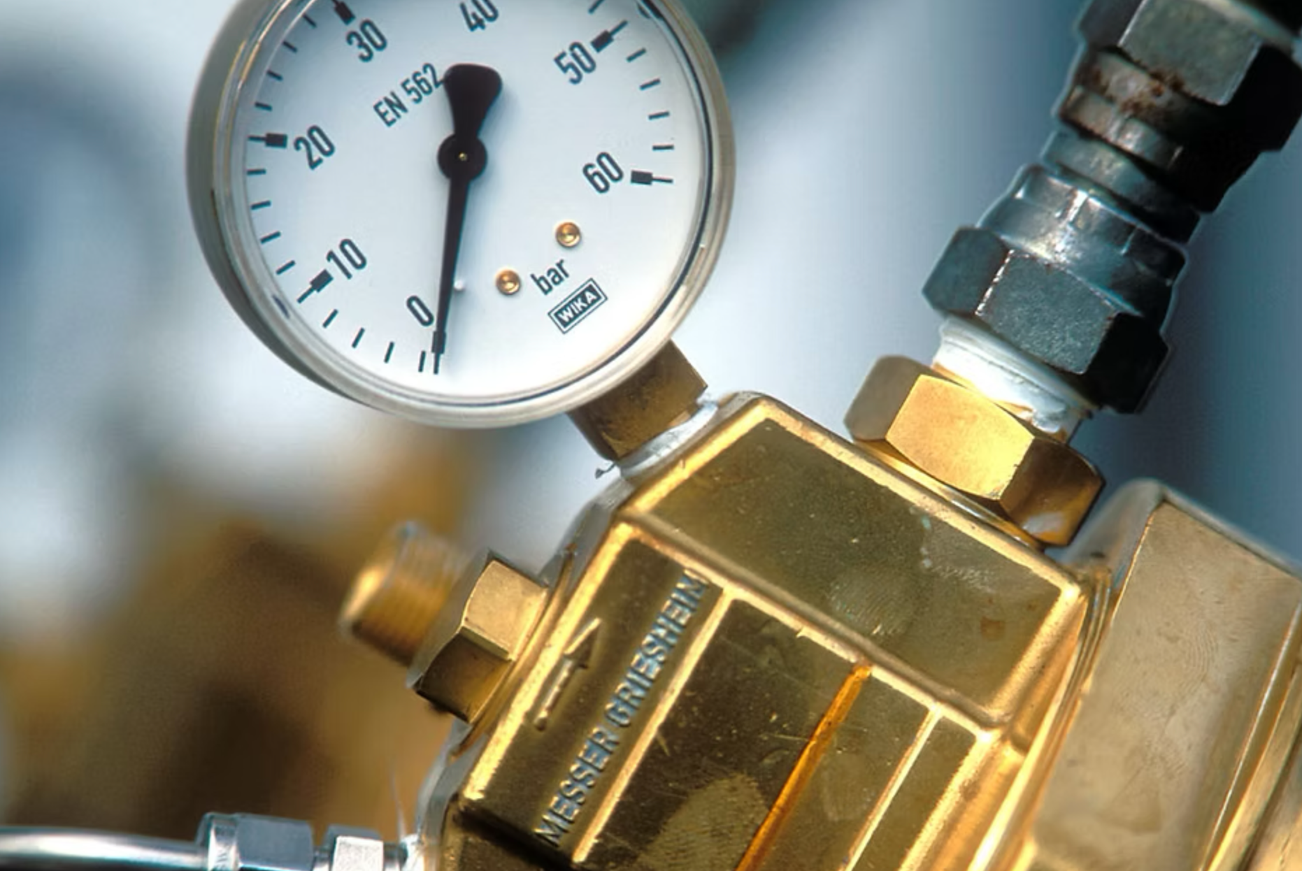 A close up of a pressure gauge on a machine