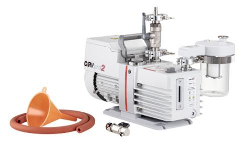White and gray vacuum pump with attached accessories, a funnel, and hoses.