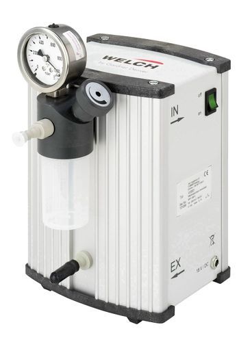 Silver Welch vacuum pump with pressure gauge, filter, power switch, and input/output ports.