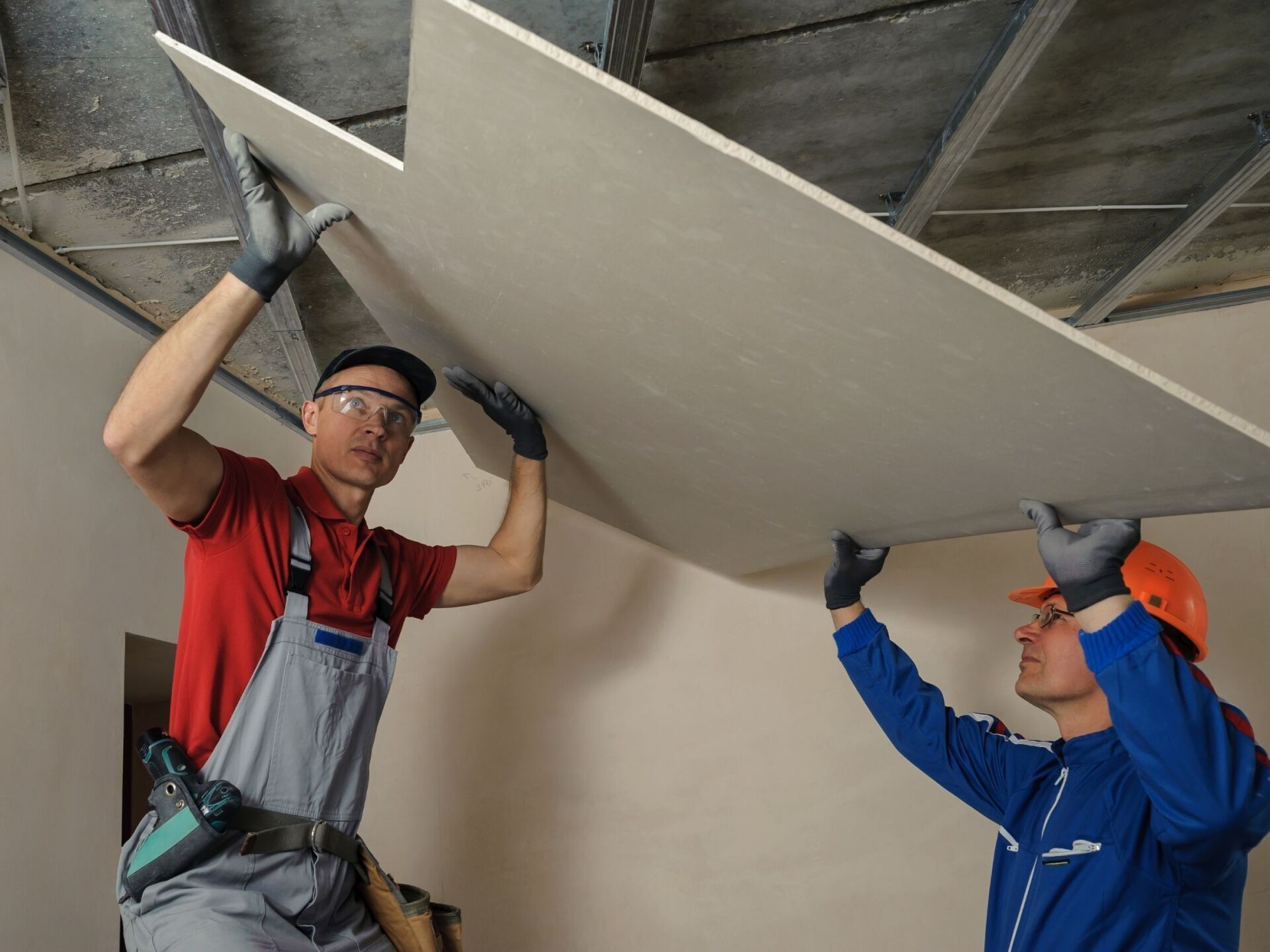 drywall installation crew working in calgary