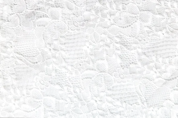 White lace fabric with floral and textured patterns.