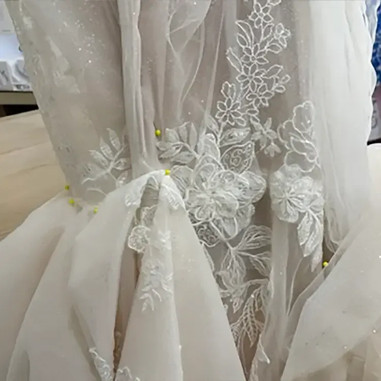 Close-up of a wedding dress back detail. Luxury Tailors by Monica