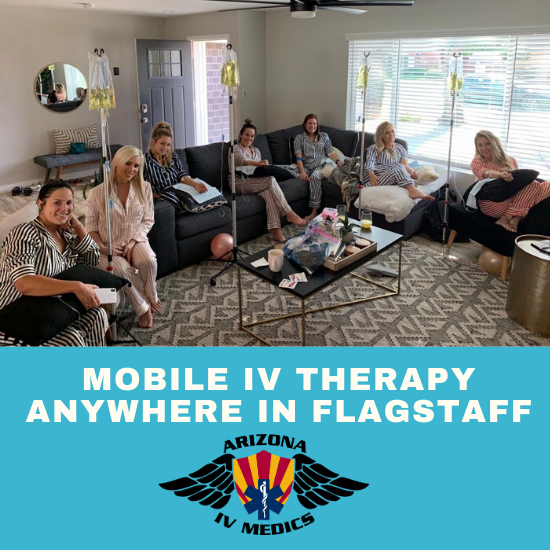 A group of people are sitting in a living room with the words mobile iv therapy anywhere in flagstaff