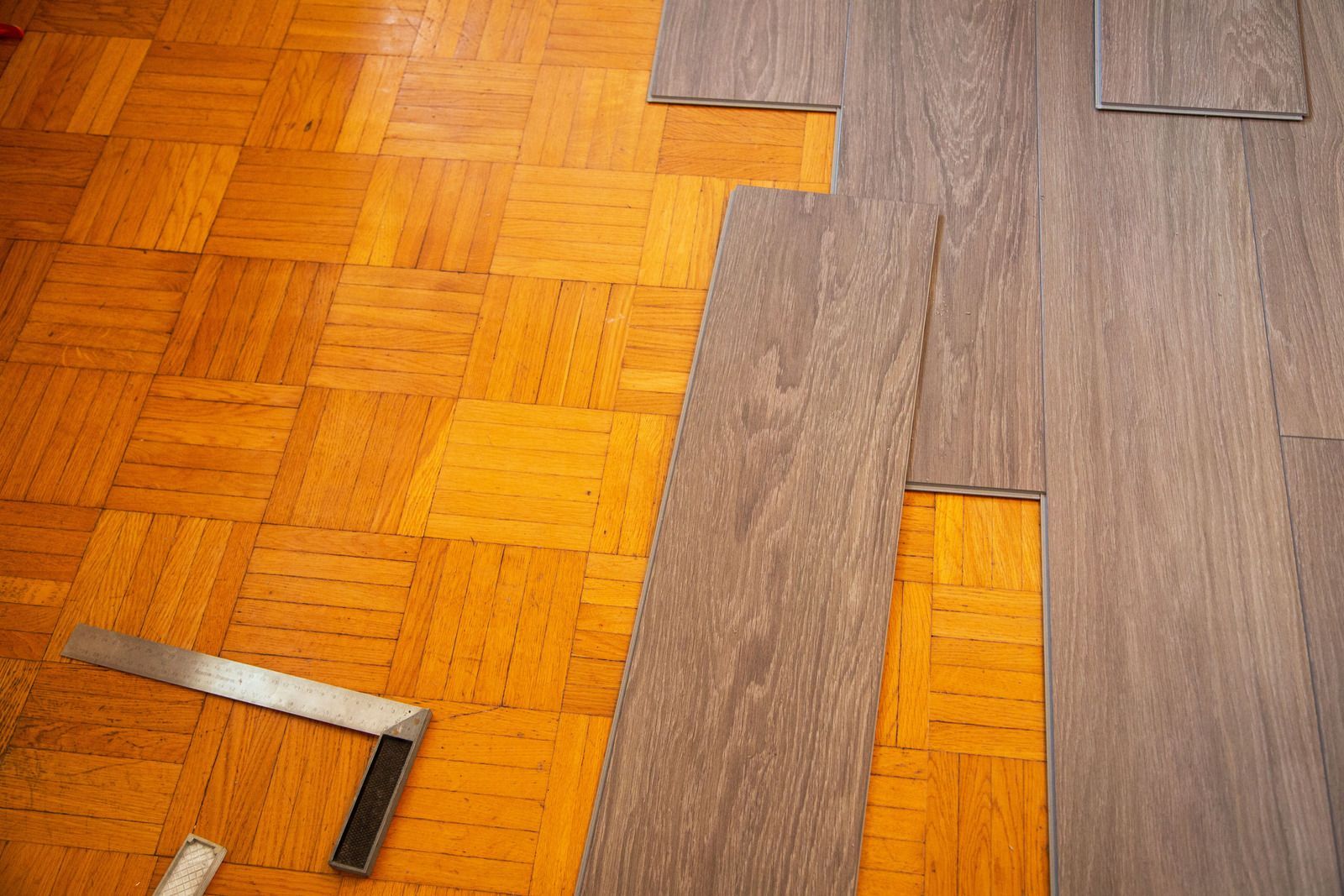 A wooden floor with a pair of squares on it.