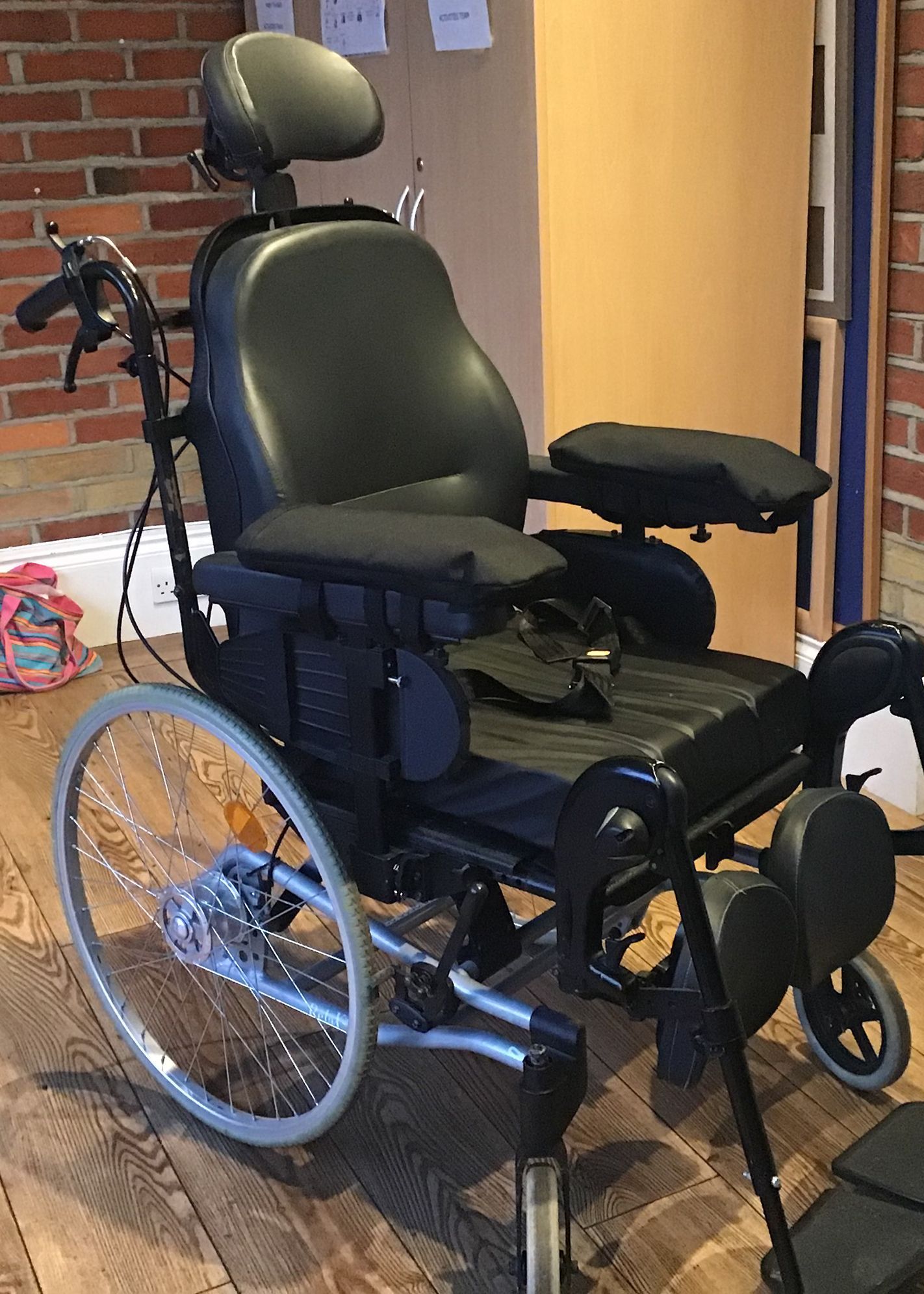 Powerchair with mitts attached