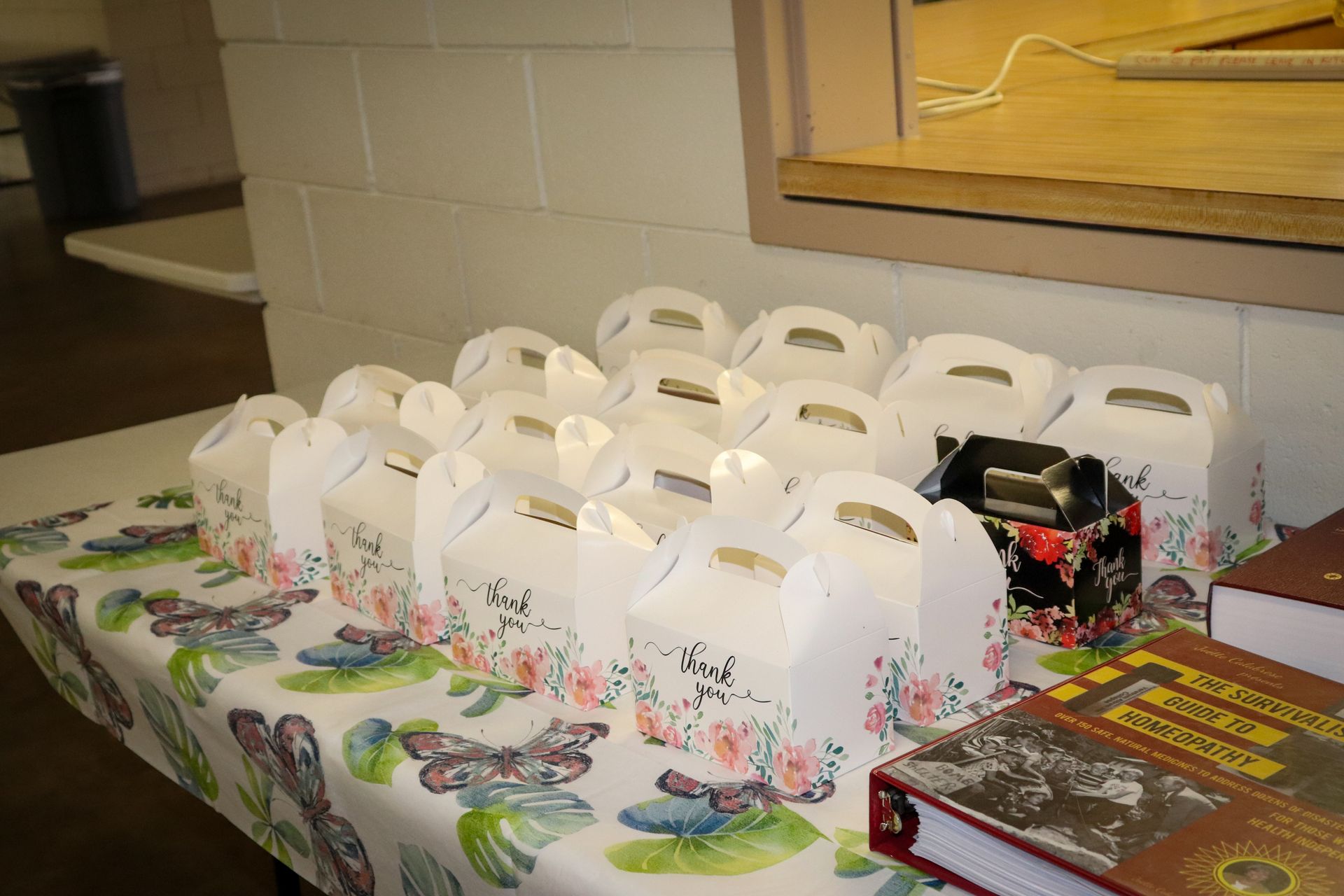 A table with boxes and a book on it