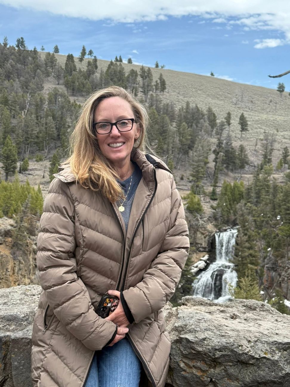 Member holding rooster