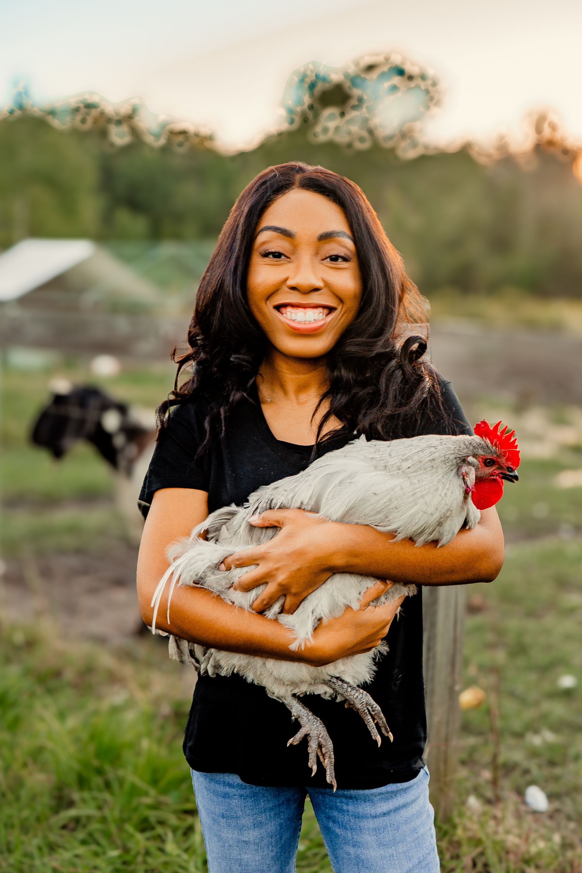 woman holding chicken