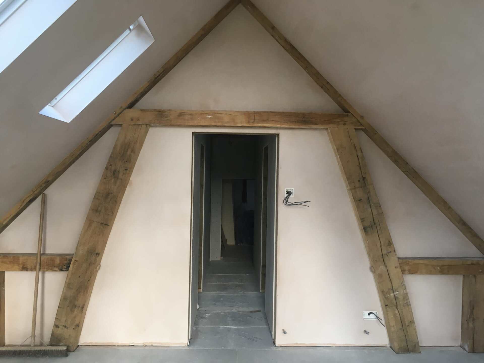 New plaster under  a pitched roof