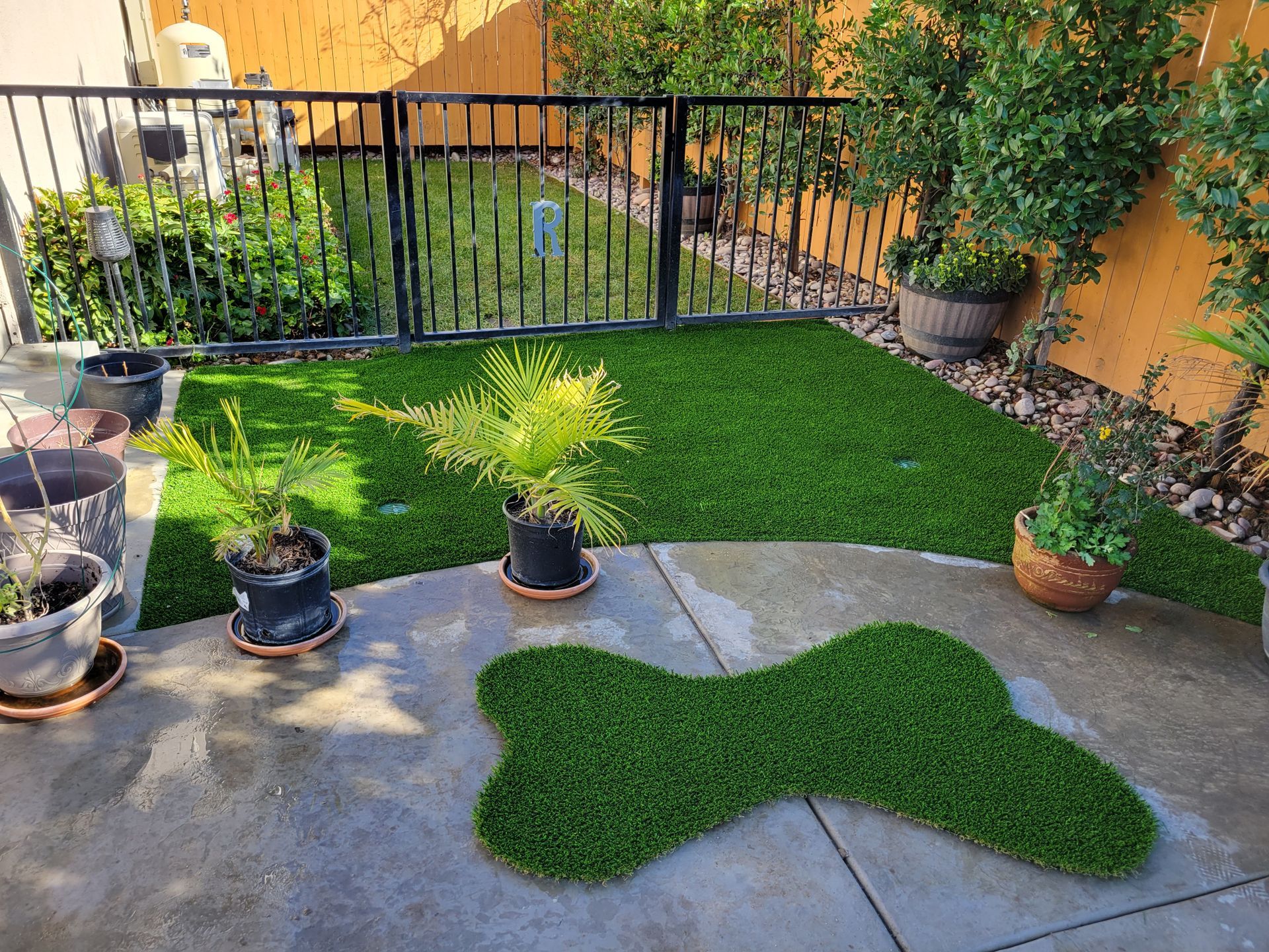 artificial grass and wrought iron