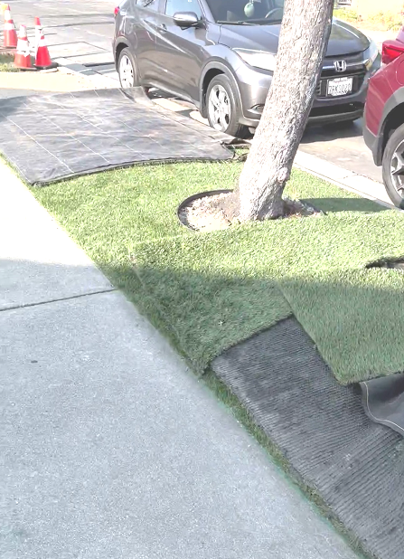 Artificial turf pulled back to repair gas lines
