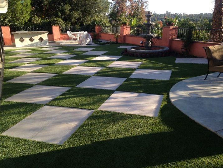 synthetic grass and pavers checkered pattern