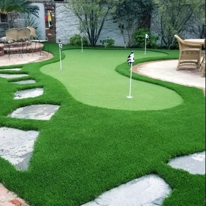 back yard putting green next to tables