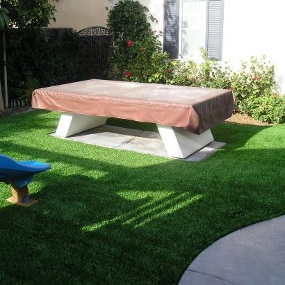 Covered table on synthetic grass