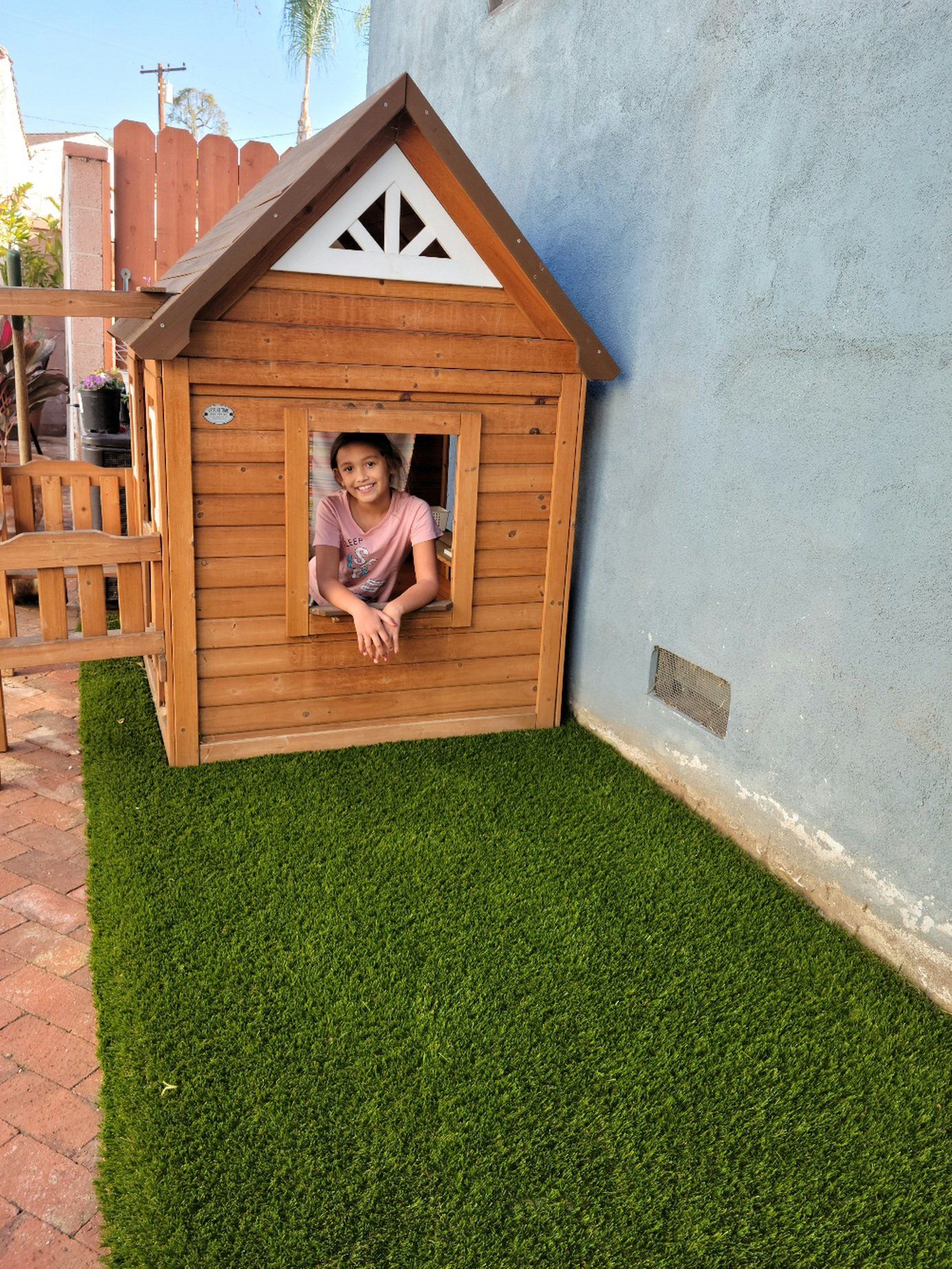 PLat house on artificial grass