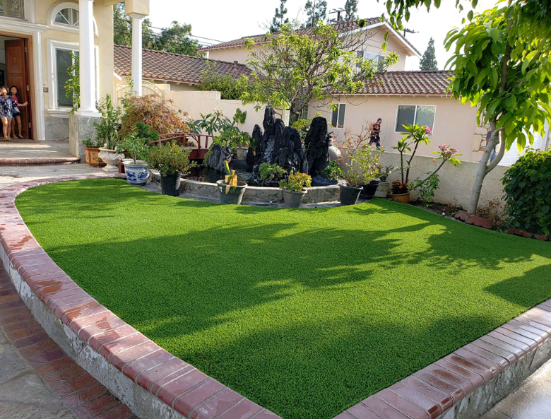 artificial grass and small retaining wall
