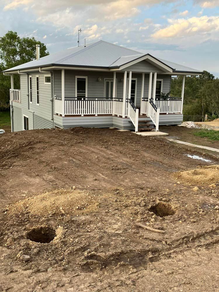Charming Queensland Residence Featuring a Grey Exterior and a Welcoming Porch — Builder In Maryborough, QLD