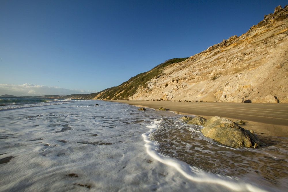 Beach With A Cliff In The Background — Builder In Gympie, QLD