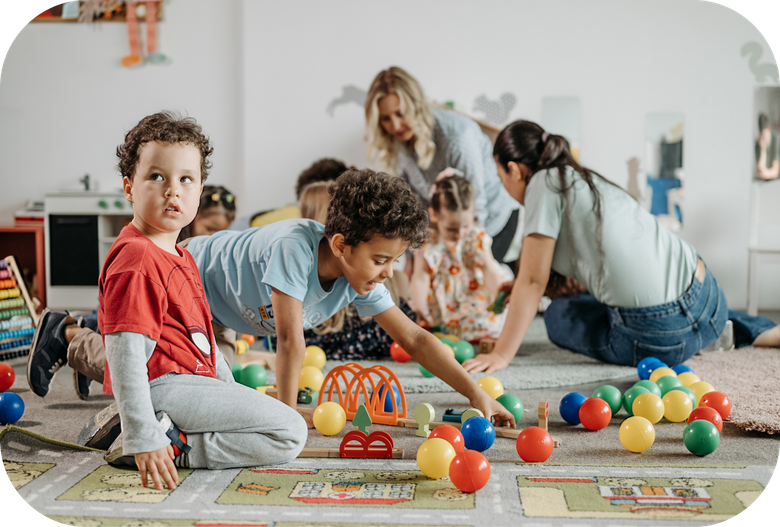 Kids playing with colorful toys and manipulatives.