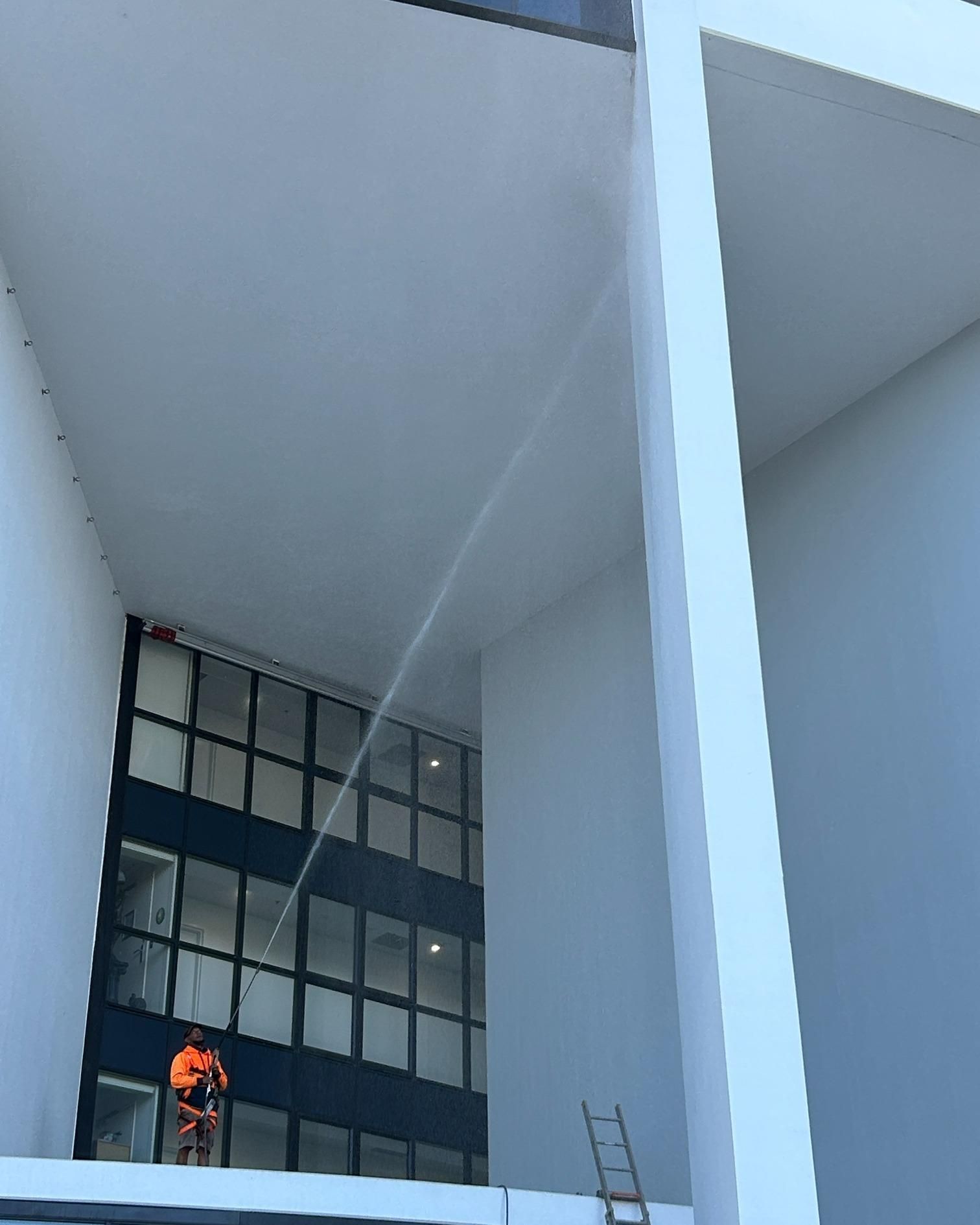 A Large Building With a Lot of Windows and a Sliding Glass Door — Hard Surface Cleaners in Sydney, NSW