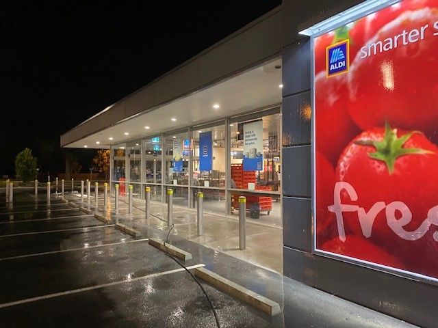 A picture of a tomato on the side of a store. — Hard Surface Cleaners in Clayton, VIC