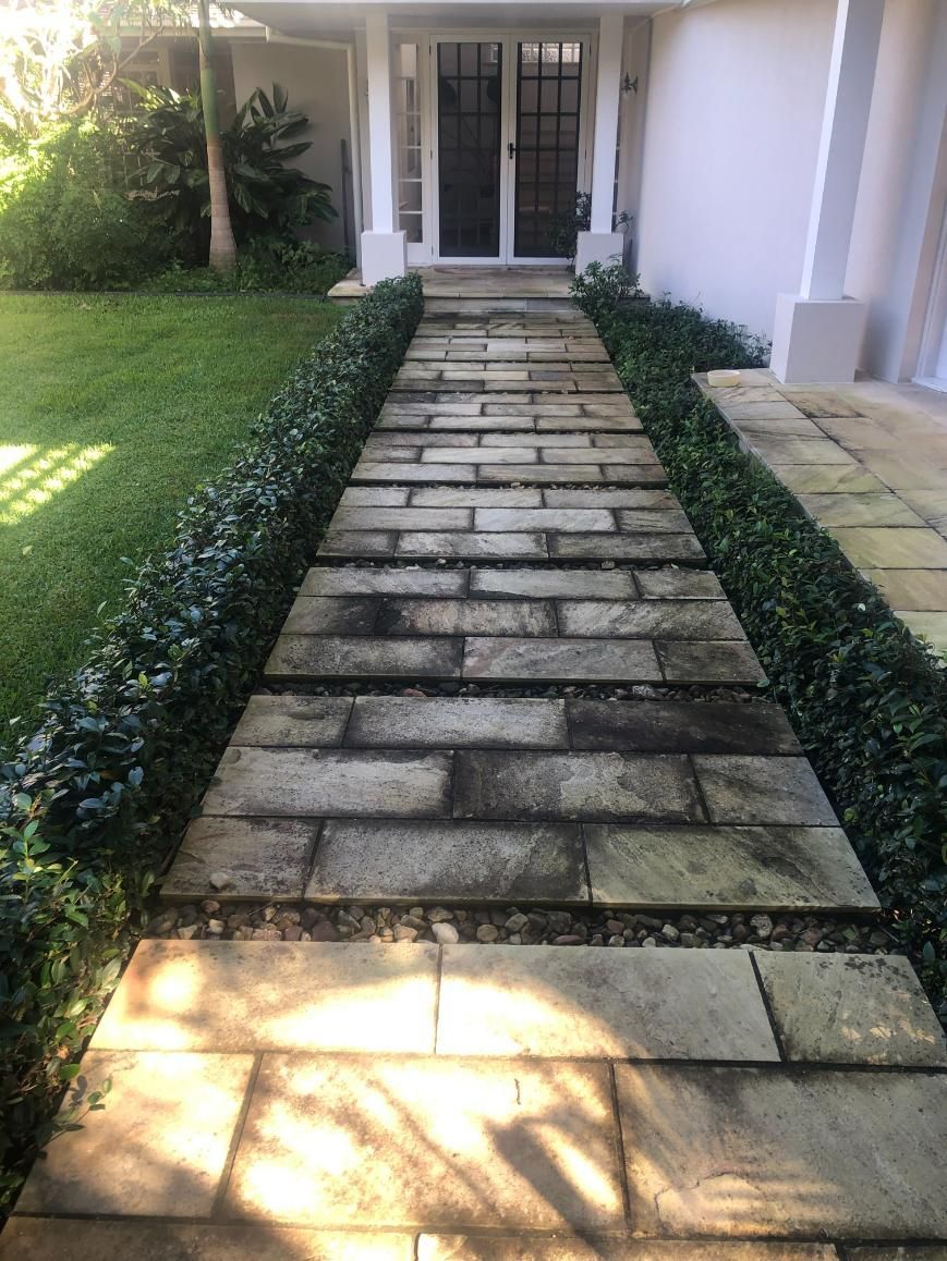  Brick Walkway Leading to The Front Door of A House — Hard Surface Cleaners in Sydney, NSW