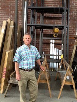 Owner Standing Beside Materials — Goldsboro, NC — Ernest Glass Co. Inc.