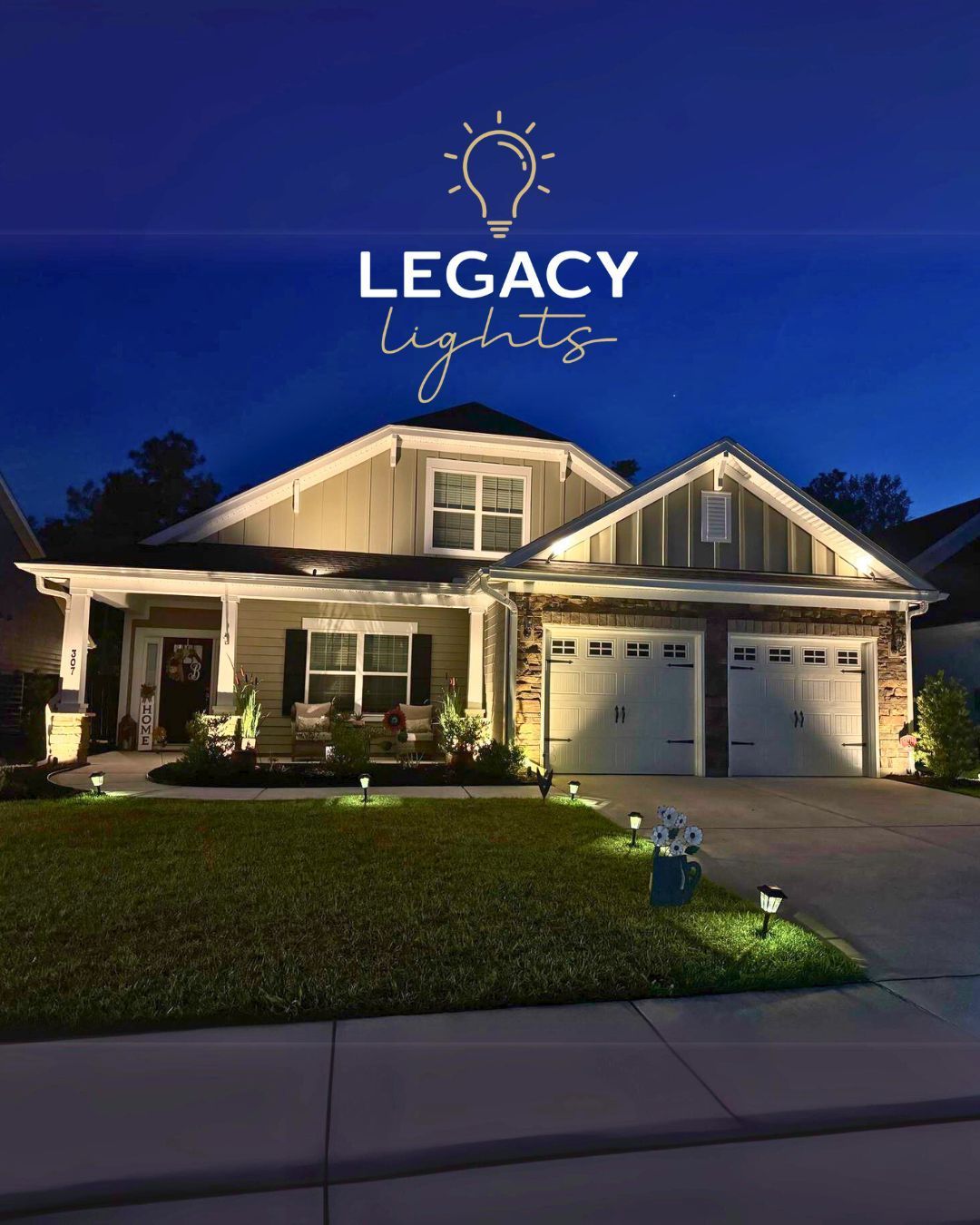 House exterior illuminated at night by Legacy Lights.