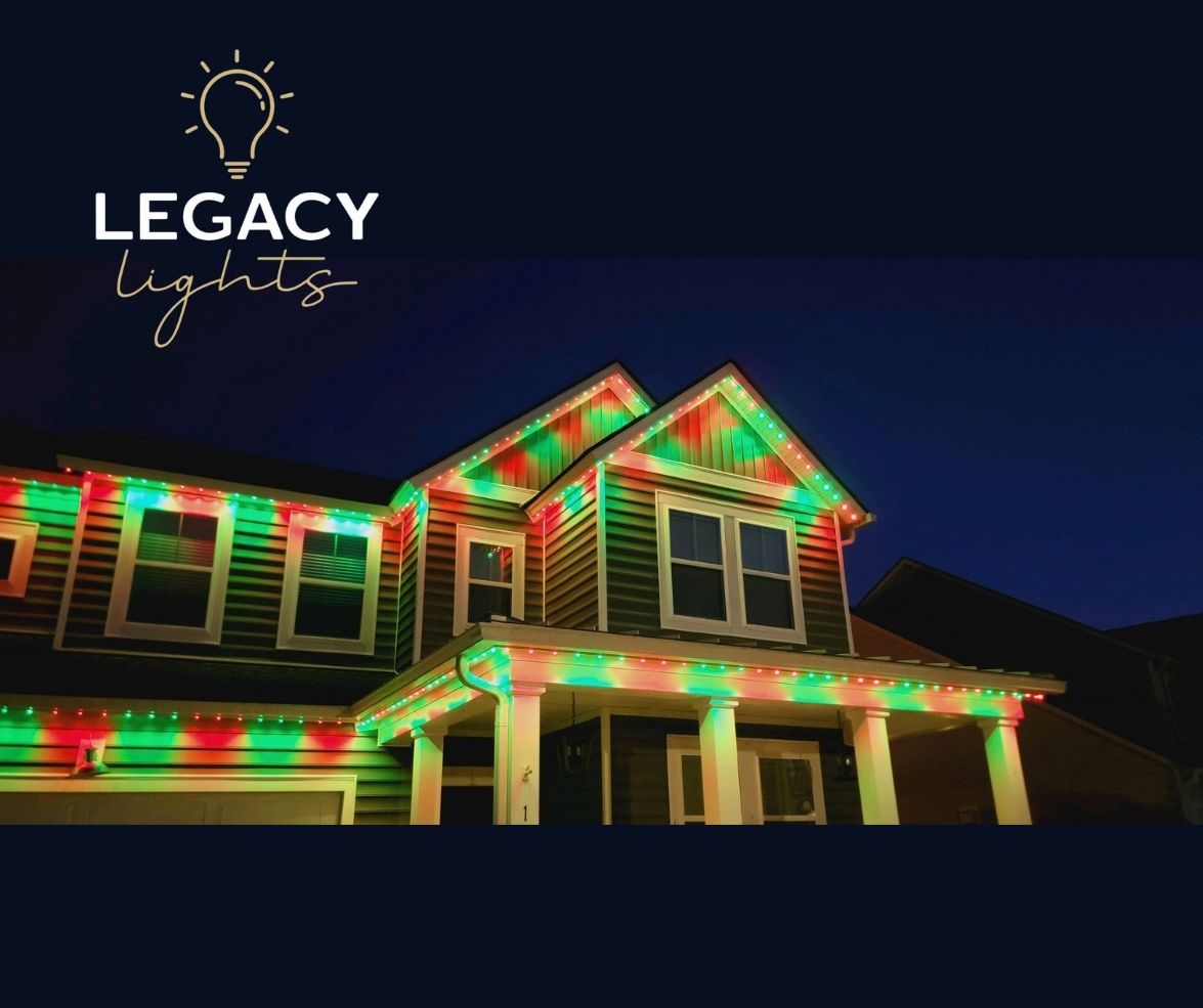 Outdoor garden lit with pink and yellow lights, white trellis, Legacy Lights logo.
