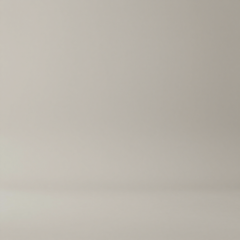 Blank beige wall with a faint horizontal seam near the bottom.