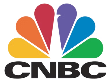 The CNBC logo, featuring a colorful six-petaled peacock icon above the bold, black, uppercase text 