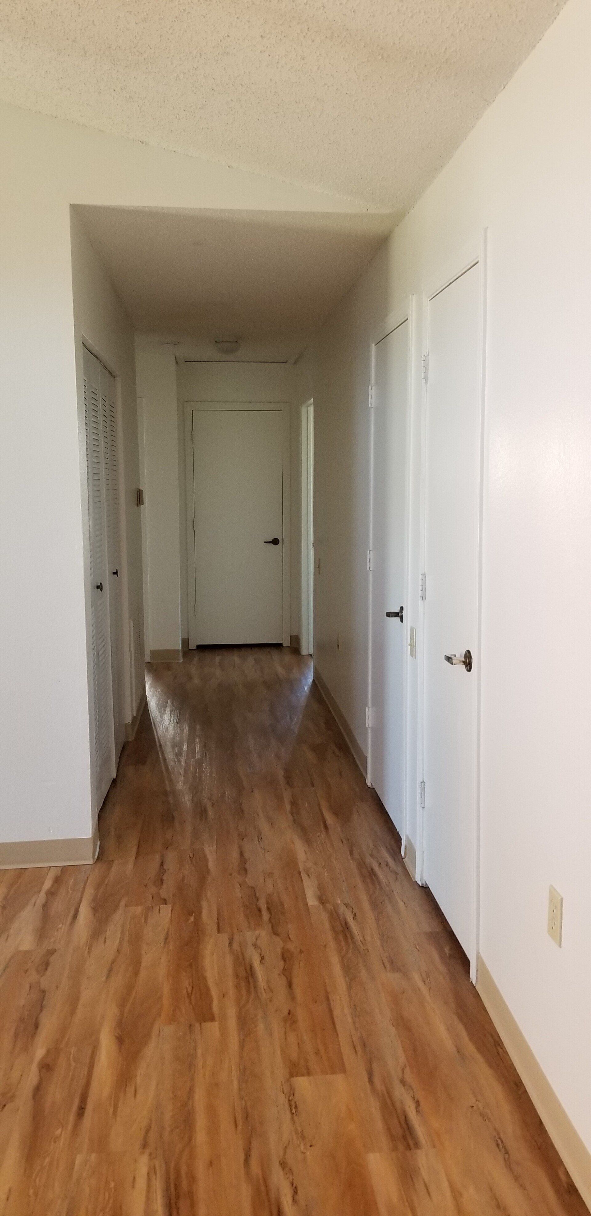 Interior of hallway with doors on both sides